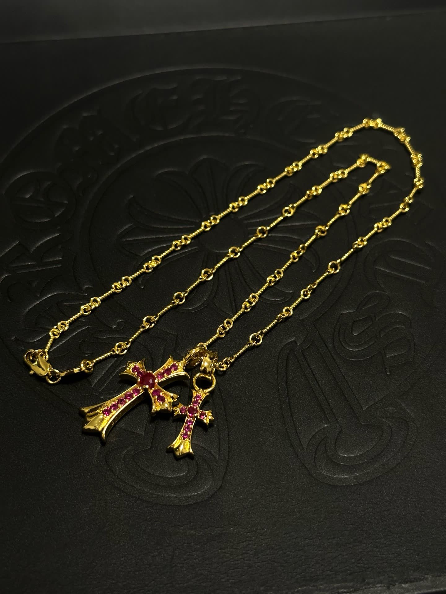 Chrome Hearts Gold Cross Pendant with Ruby Stones